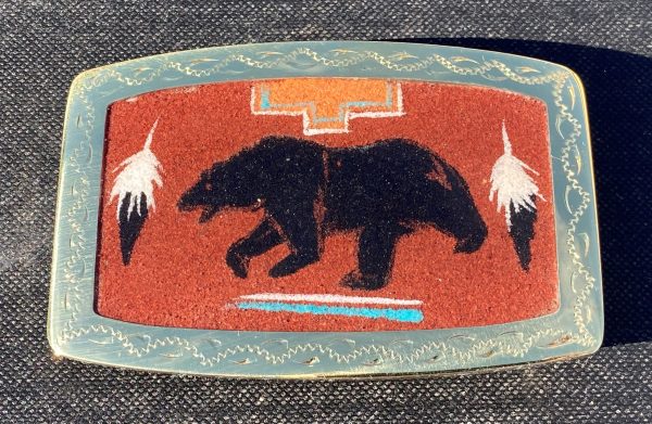 Bear with Feathers and Sandpainted Background
